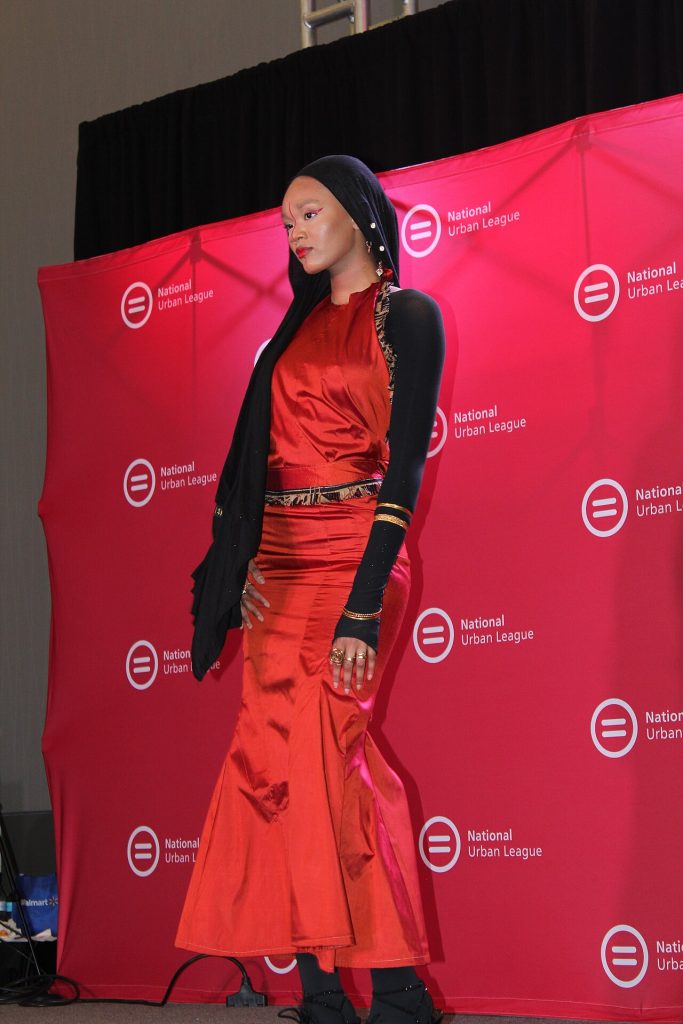Model Walking In Black In Style: The Ultimate Fashion Face-off/pitch C — Fashion & Apparel | RESIMLAND